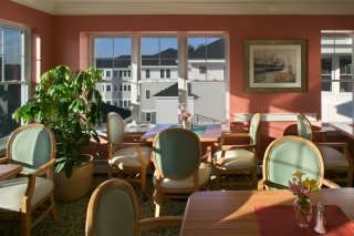 Sun-drenched dining area designed for seniors living in this NH CCRC