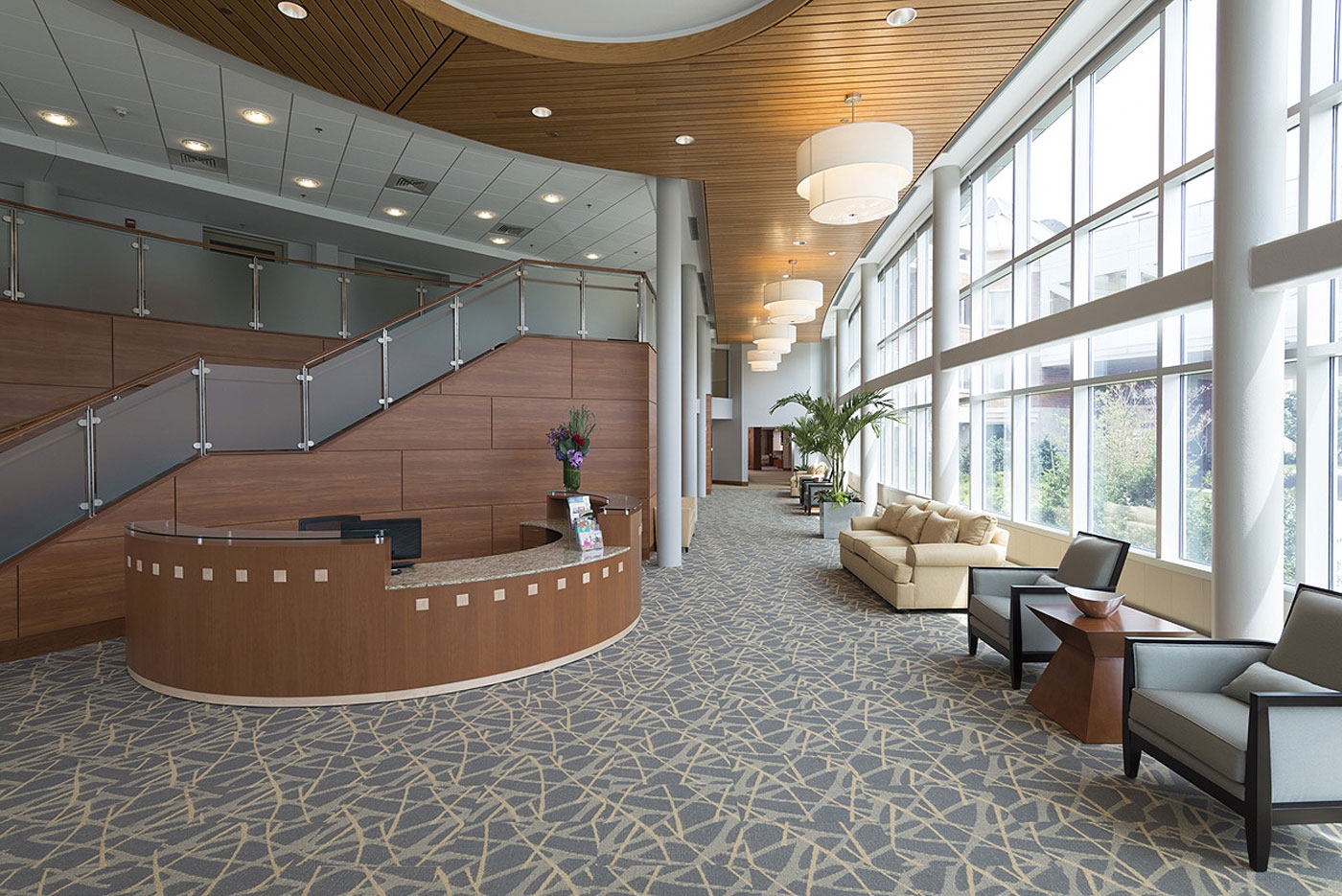 Our interior design highlights natural light in this lobby of a CCRC