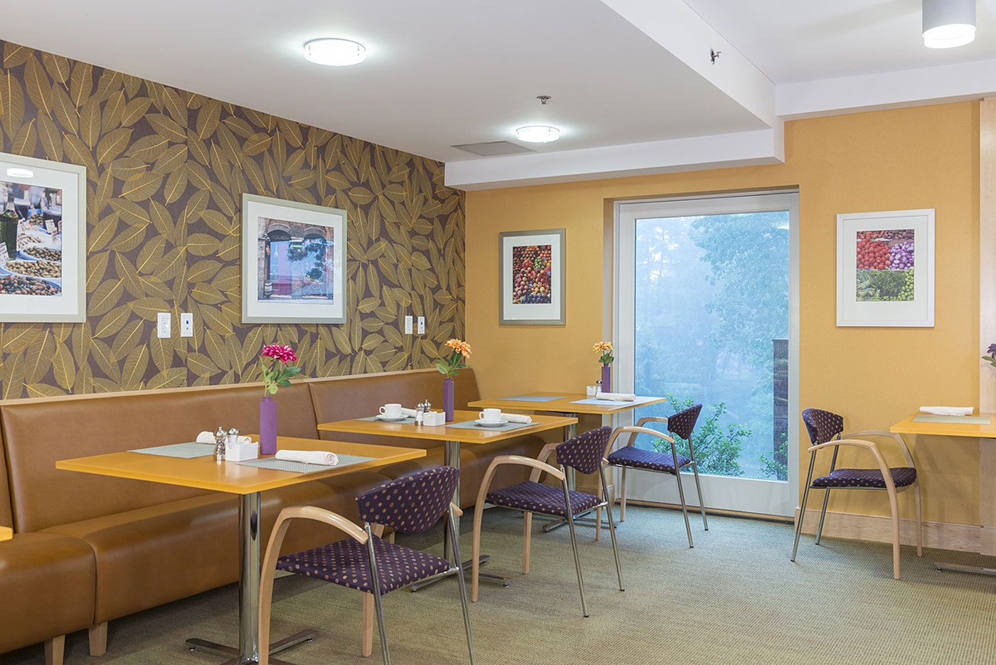 Cozy corner for smaller group socializing in a CCRC community dining area