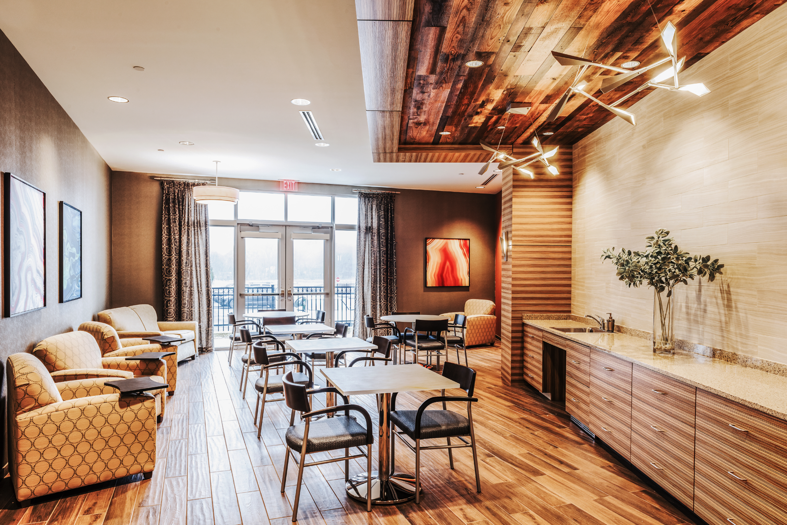 Modern rustic cafe designed by WDC interior designers in assisted living  community